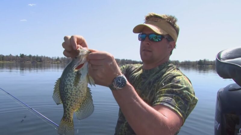 Angler Fishing for Crappie in A Lake During Early Spring