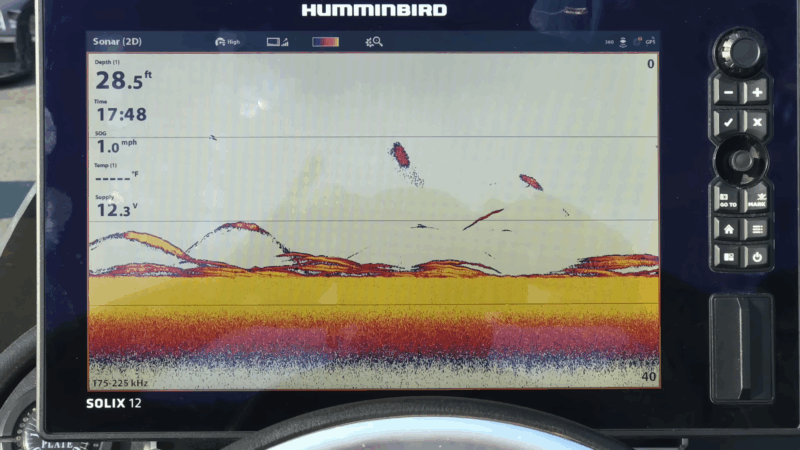 Fish finder display showing underwater terrain and suspended fish at 28.5 ft depth